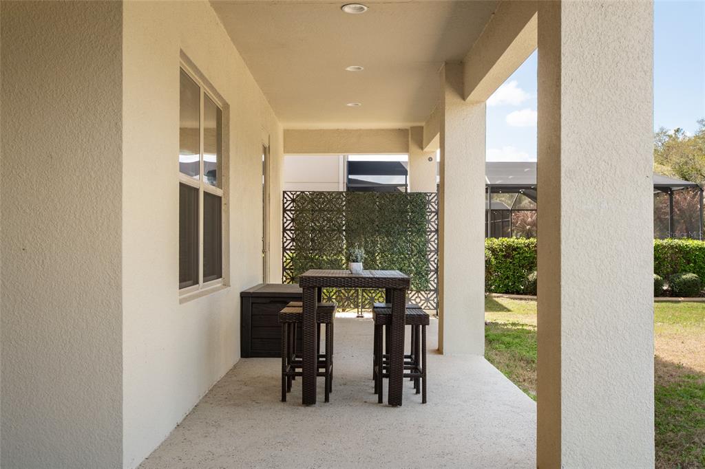 615 Timbervale Trail Clermont, FL 34715 - Photo 49 of 100 a view of a dining room with furniture window and outside view