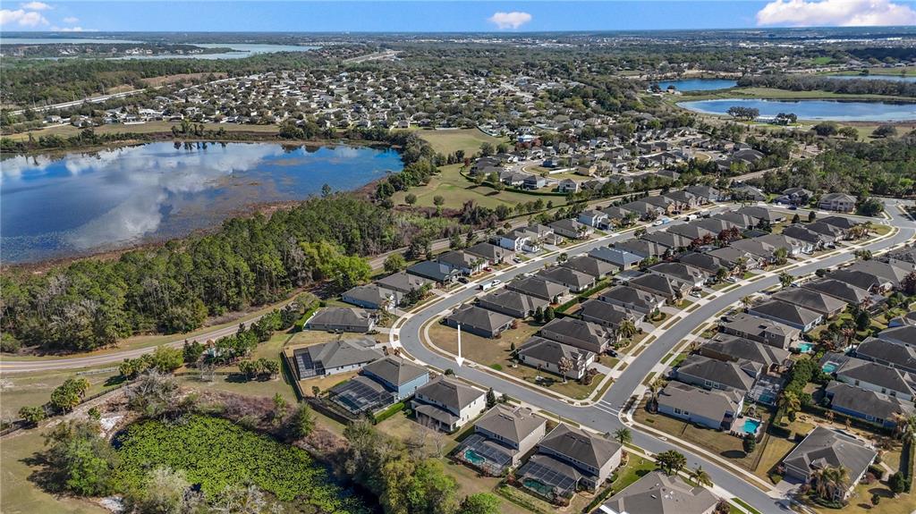 615 Timbervale Trail Clermont, FL 34715 - Photo 77 of 100 an aerial view of residential building with outdoor space