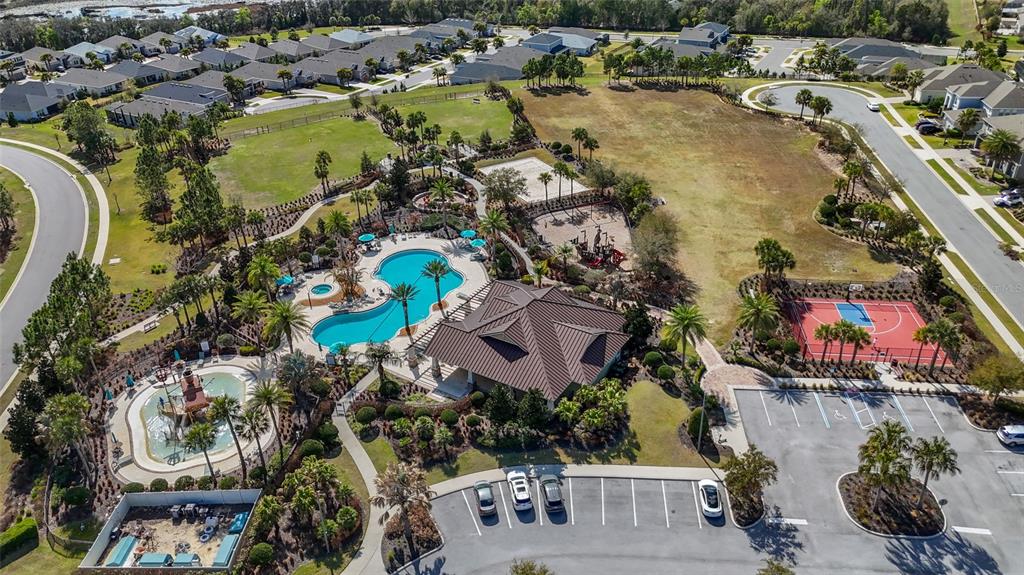 615 Timbervale Trail Clermont, FL 34715 - Photo 82 of 100 an aerial view of residential houses with outdoor space