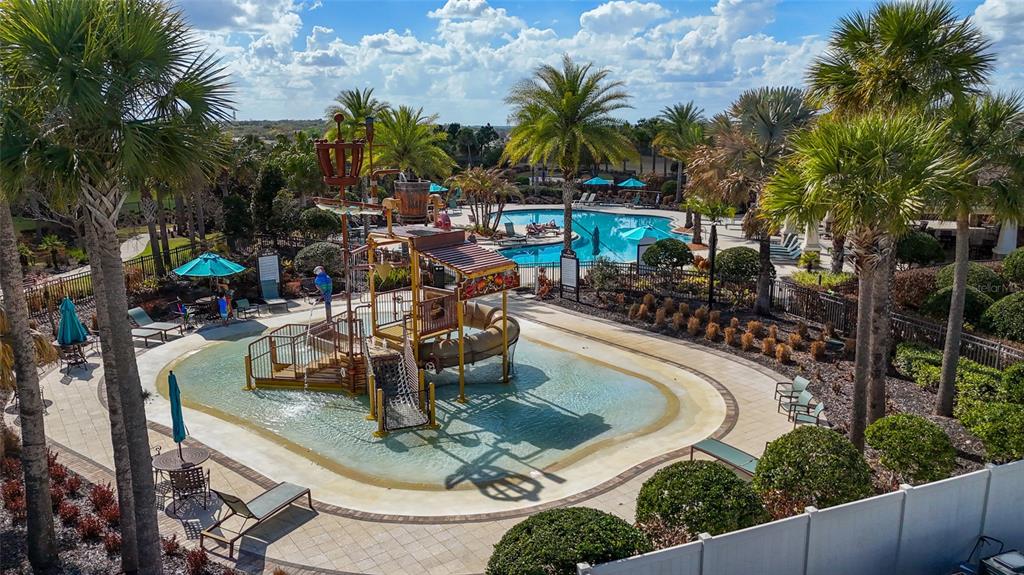 615 Timbervale Trail Clermont, FL 34715 - Photo 91 of 100 a view of a swimming pool with a patio