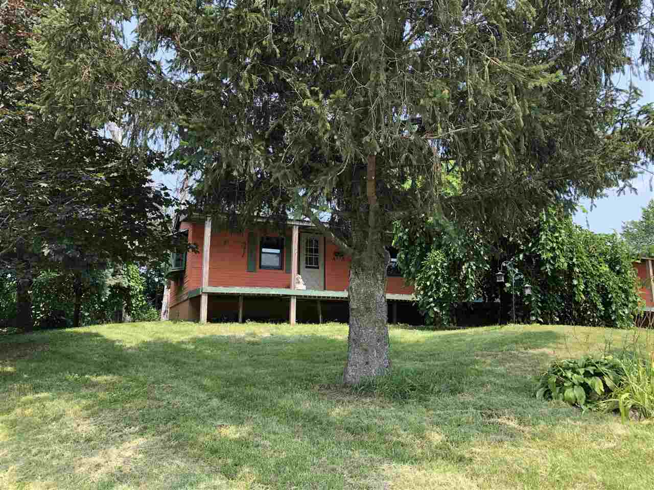 1676 Whitney Road Franklin Grove, IL 61031 - Photo 28 of 28 a front view of a house with a yard