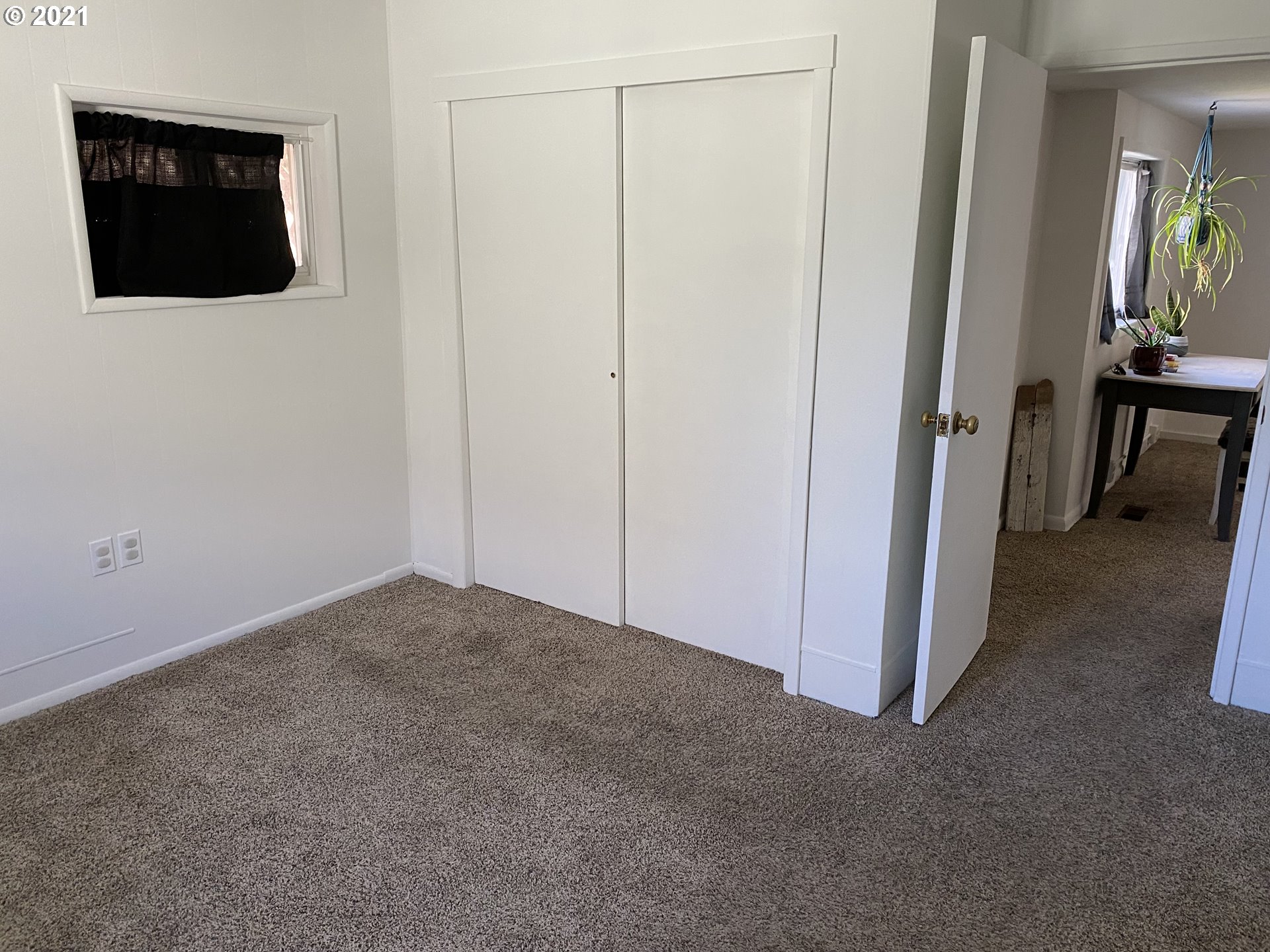 1515 Southwest Frazer Avenue Pendleton, OR 97801 - Photo 5 of 11 a view of a livingroom with wooden floor and a flat screen tv