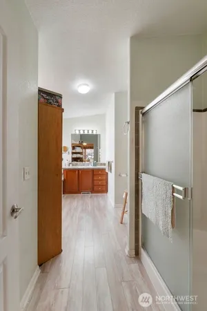 a view of kitchen view with wooden floor and refrigerator