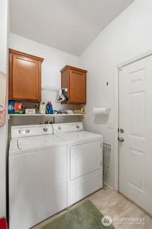 a room with dryer and washer