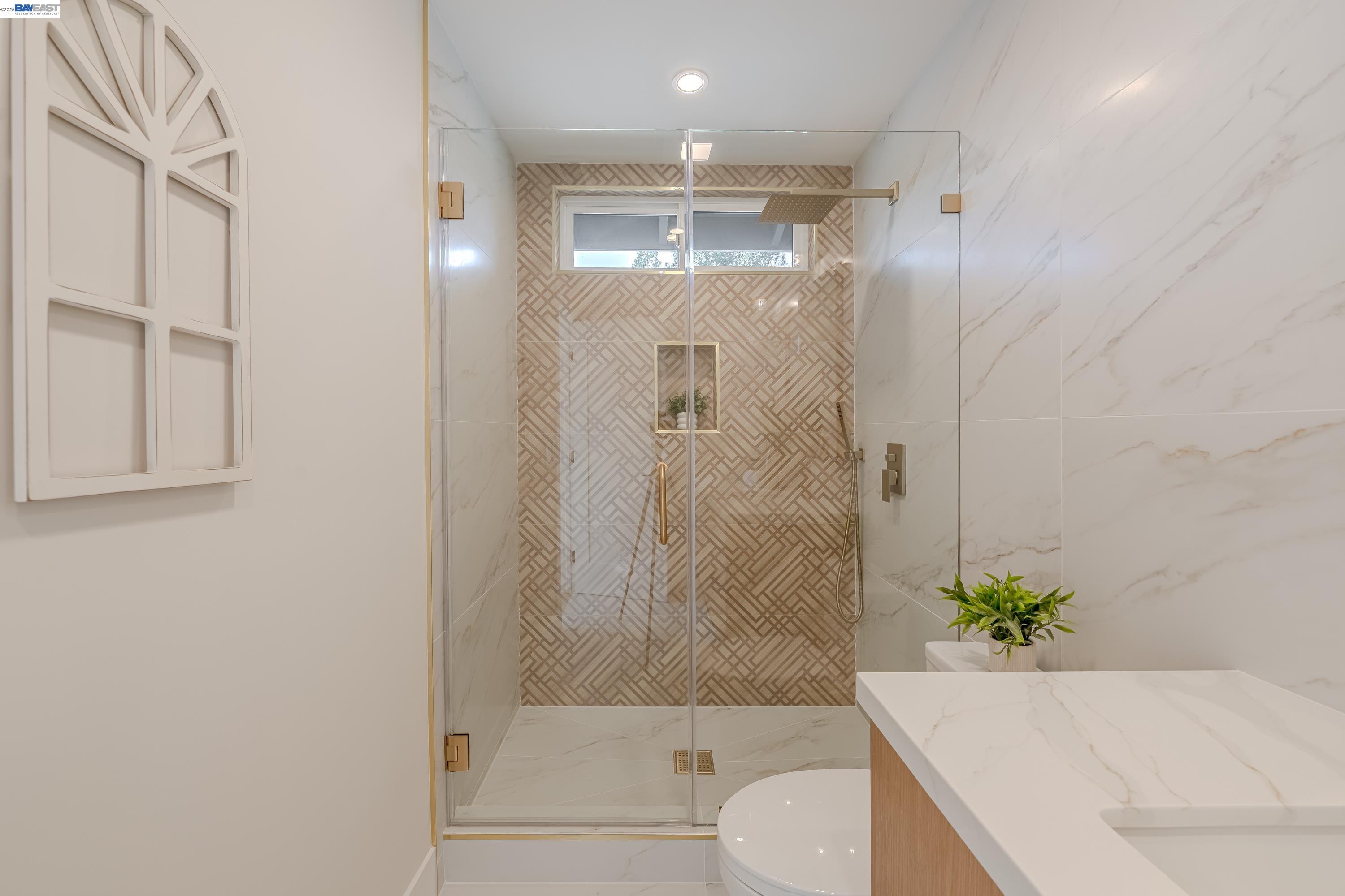 311 Foxboro Court San Ramon, CA 94583 - Photo 12 of 46 a bathroom with a shower and a toilet