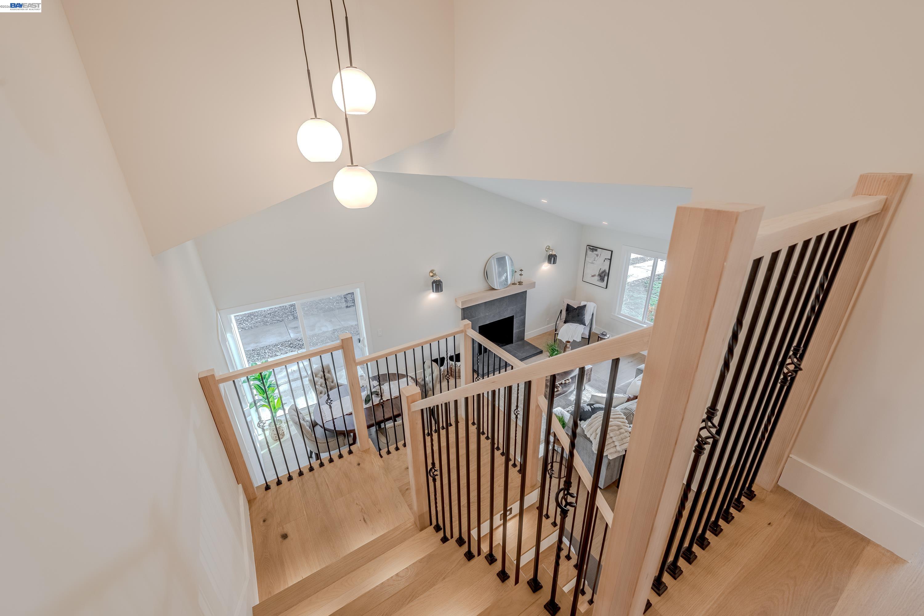 311 Foxboro Court San Ramon, CA 94583 - Photo 45 of 46 a view of staircase with railing and a chandelier
