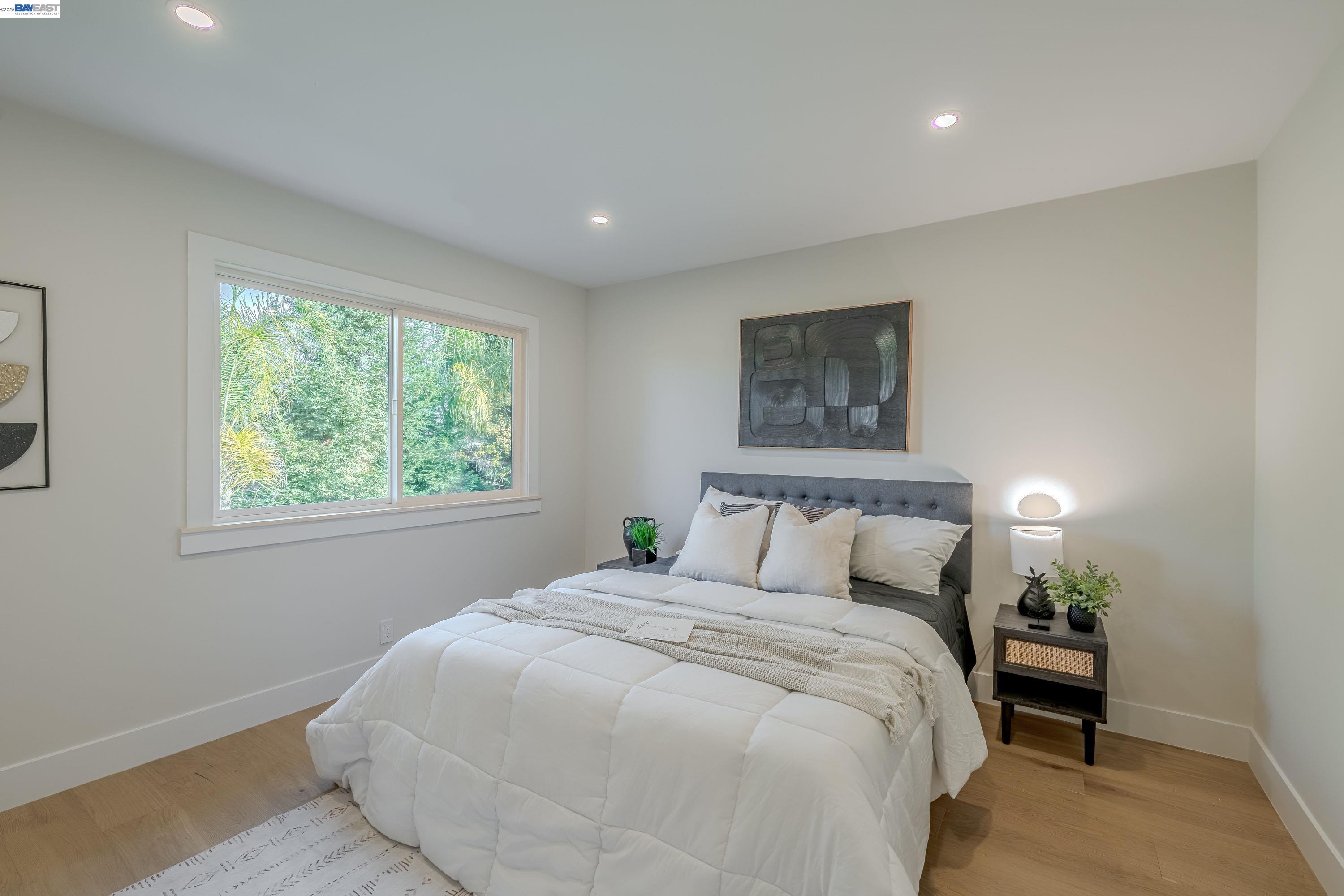311 Foxboro Court San Ramon, CA 94583 - Photo 8 of 46 a large bed sitting in a bedroom next to a window