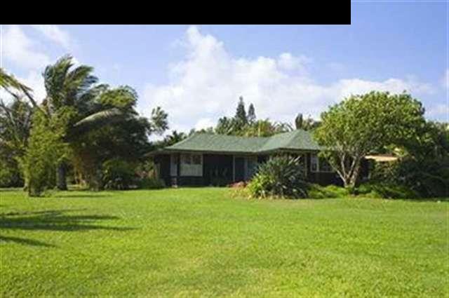 491 North Honokala Road Haiku, HI 96708 - Photo 23 of 25 a front view of a house with garden