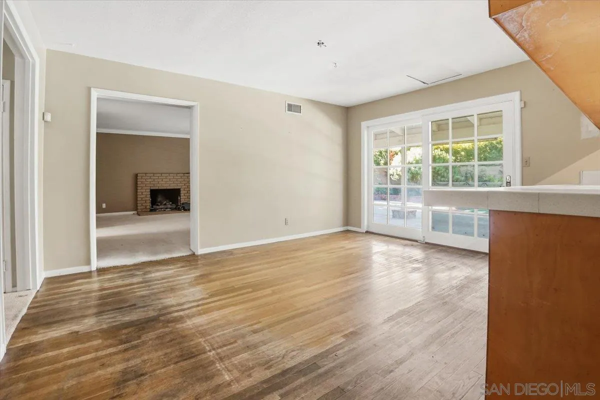 1262 Brittany Cross Road North Tustin, CA 92705 - Photo 12 of 35 a view of empty room with wooden floor and fan