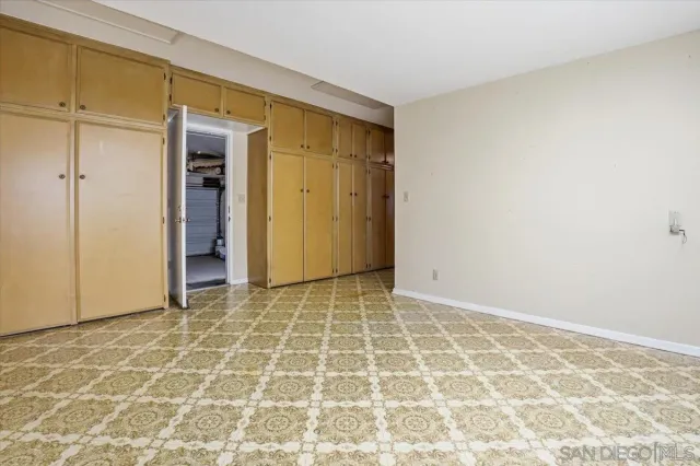 an empty room with a natural light