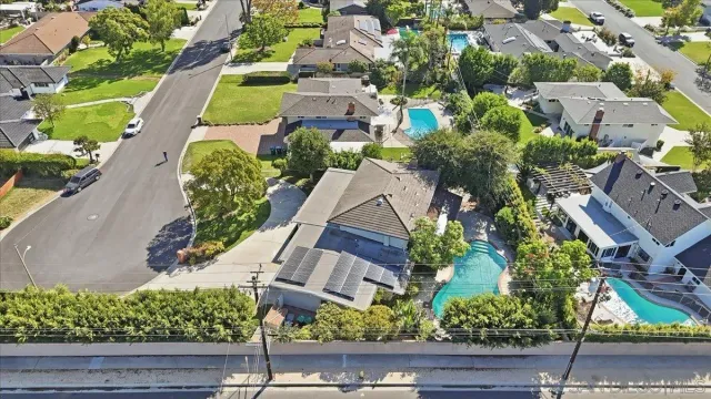 a view of a house with swimming pool
