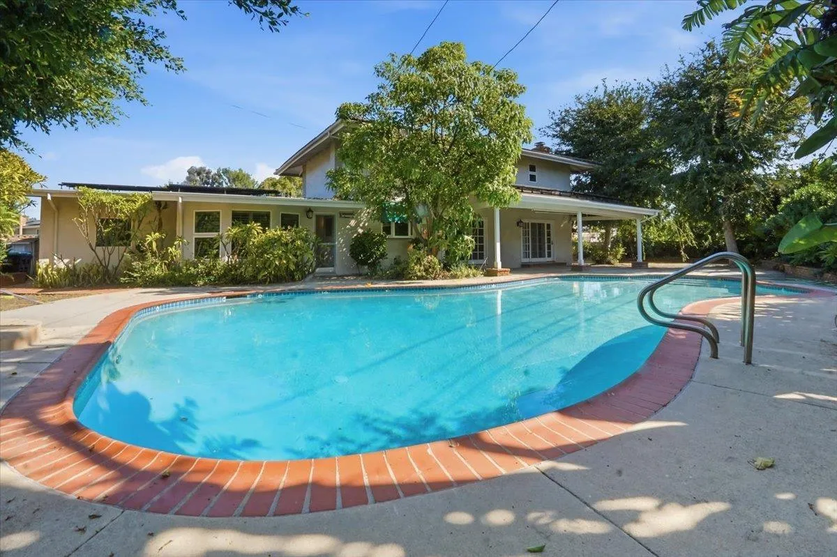 1262 Brittany Cross Road North Tustin, CA 92705 - Photo 21 of 35 a view of a house with swimming pool