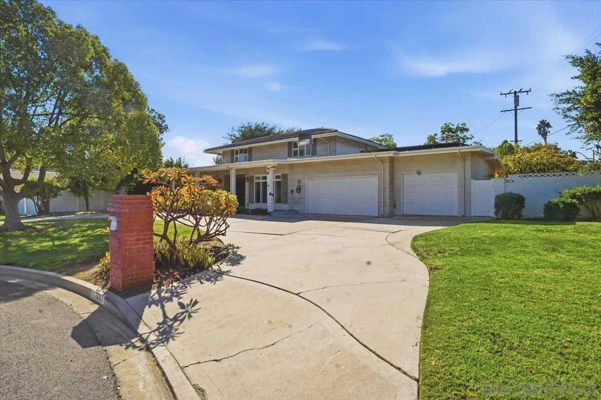 1262 Brittany Cross Road North Tustin, CA 92705 - Photo 24 of 35 a front view of a house with a yard