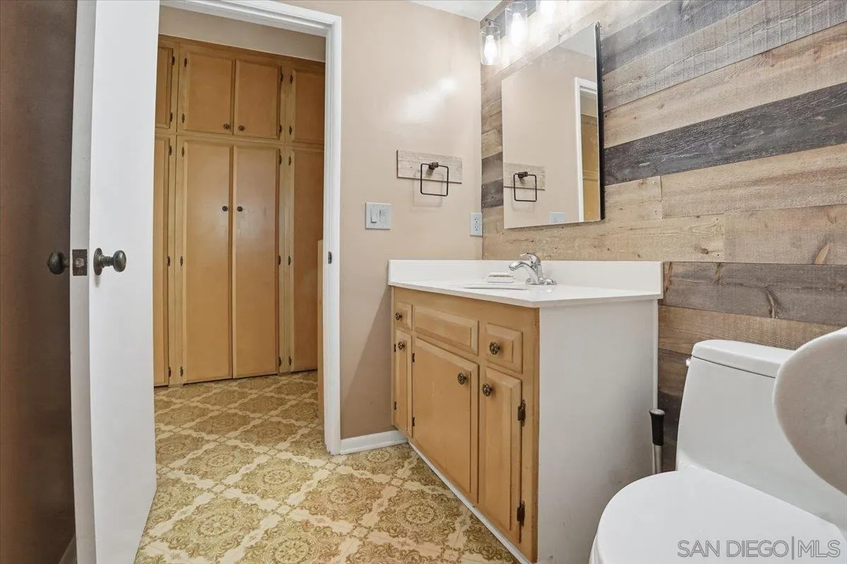 1262 Brittany Cross Road North Tustin, CA 92705 - Photo 28 of 35 a bathroom with a sink toilet and shower