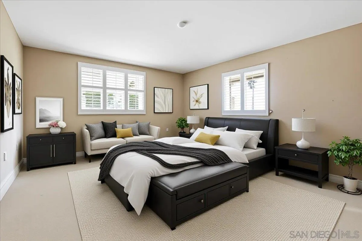 1262 Brittany Cross Road North Tustin, CA 92705 - Photo 8 of 35 a spacious bedroom with a bed and a couch