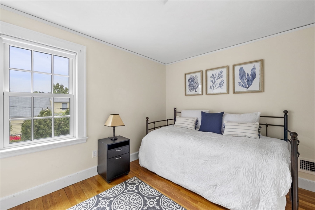 30 Rose Avenue Marblehead, MA 01945 - Photo 26 of 42 a bedroom with a bed and a window