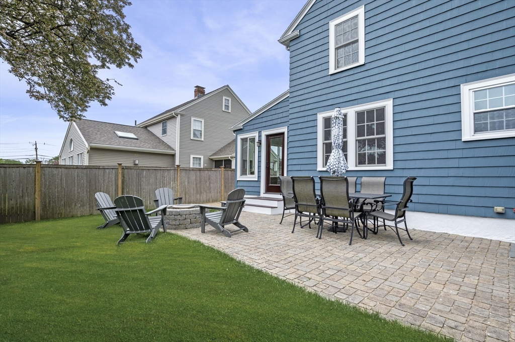 30 Rose Avenue Marblehead, MA 01945 - Photo 38 of 42 a view of a house with a backyard and sitting area