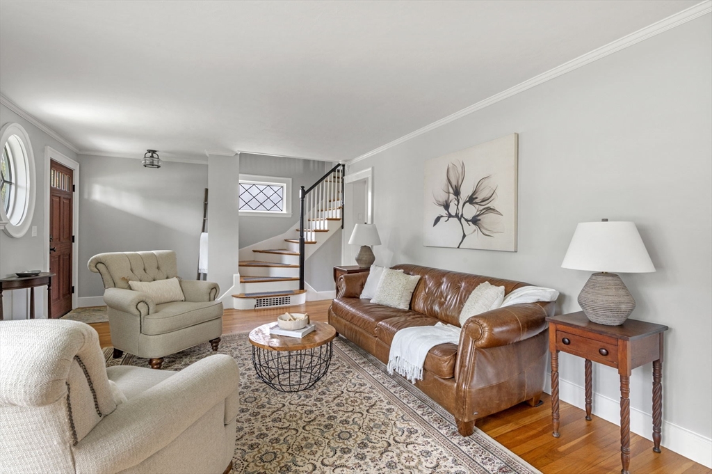 30 Rose Avenue Marblehead, MA 01945 - Photo 7 of 42 a living room with furniture and a lamp