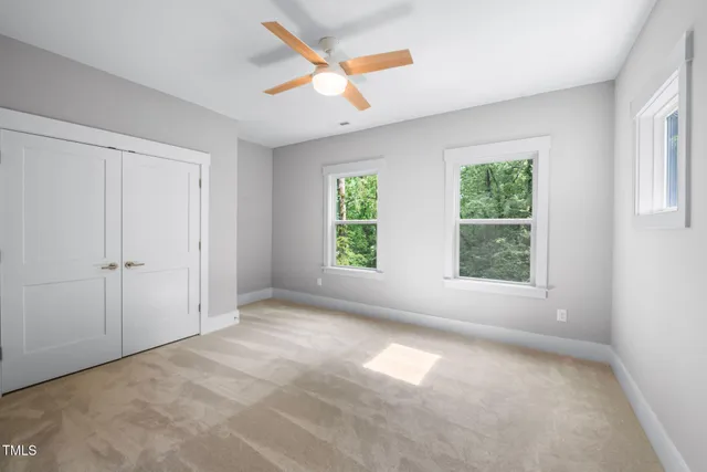 a view of a room that has a large window