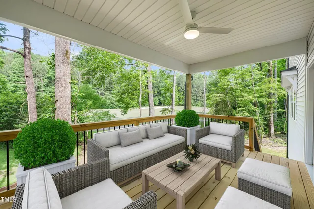 a outdoor living space with furniture and garden view