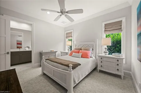 a bathroom with a toilet sink and shower