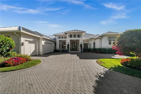 a garden view with a fountain