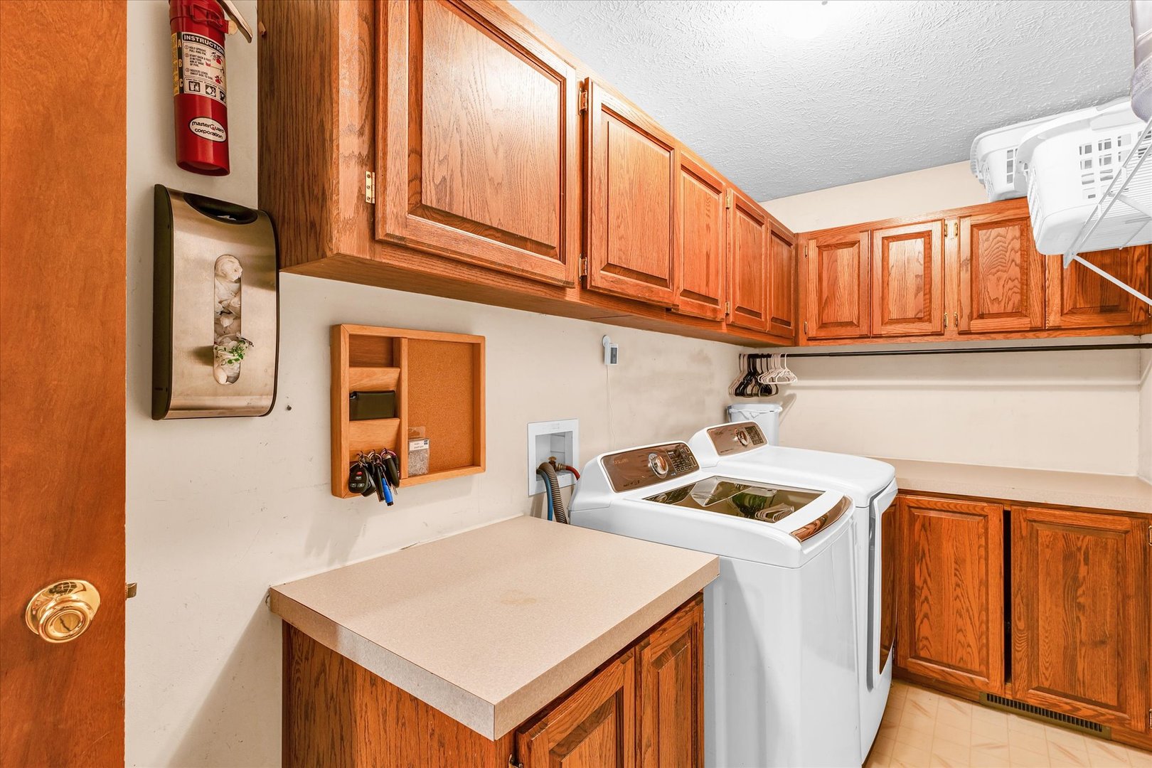 7795 Buttercup Road Weldon, IL 61882 - Photo 16 of 47 a utility room with dryer and washer