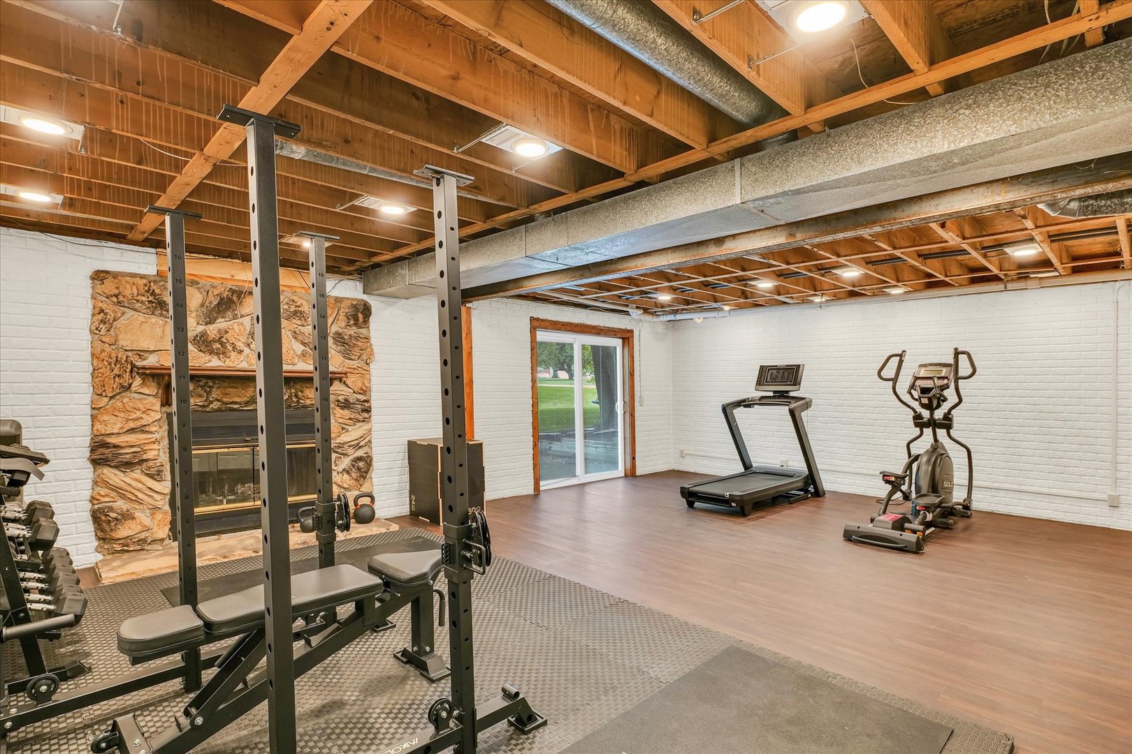 7795 Buttercup Road Weldon, IL 61882 - Photo 31 of 47 a view of a room with gym equipment