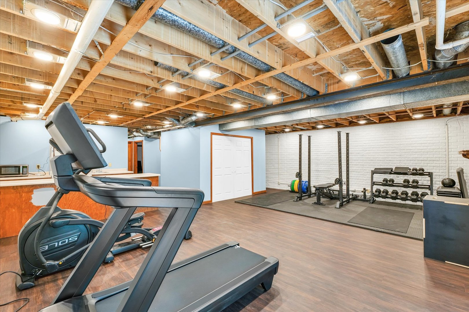 7795 Buttercup Road Weldon, IL 61882 - Photo 32 of 47 a view of a room with gym equipment