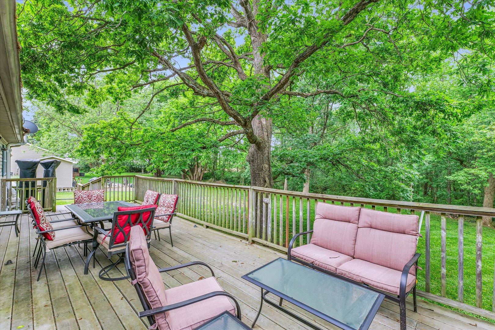 7795 Buttercup Road Weldon, IL 61882 - Photo 46 of 47 an outdoor sitting area with furniture and wooden floor