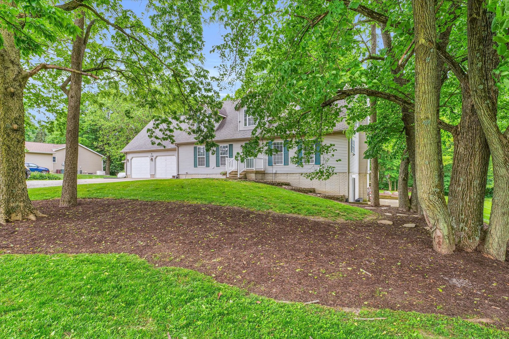 7795 Buttercup Road Weldon, IL 61882 - Photo 5 of 47 a view of a house with a backyard