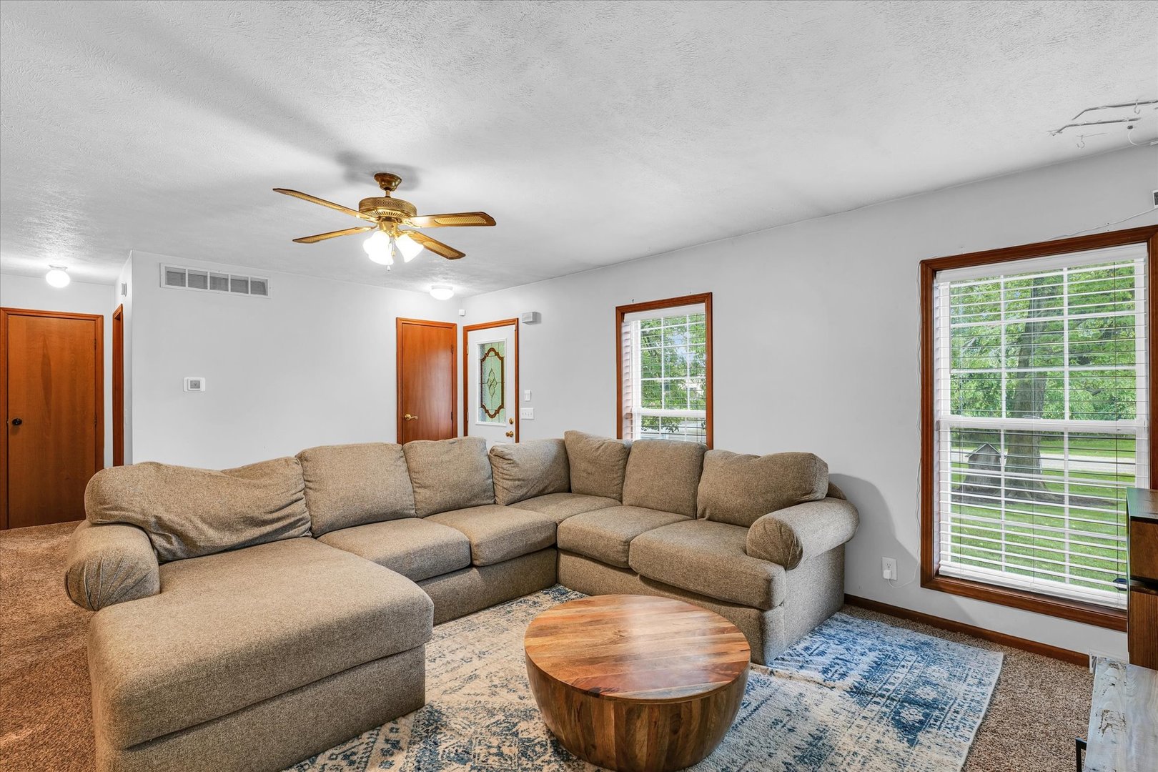 7795 Buttercup Road Weldon, IL 61882 - Photo 9 of 47 a living room with furniture and a window