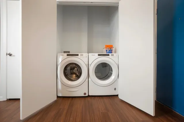 a utility room with dryer and washer