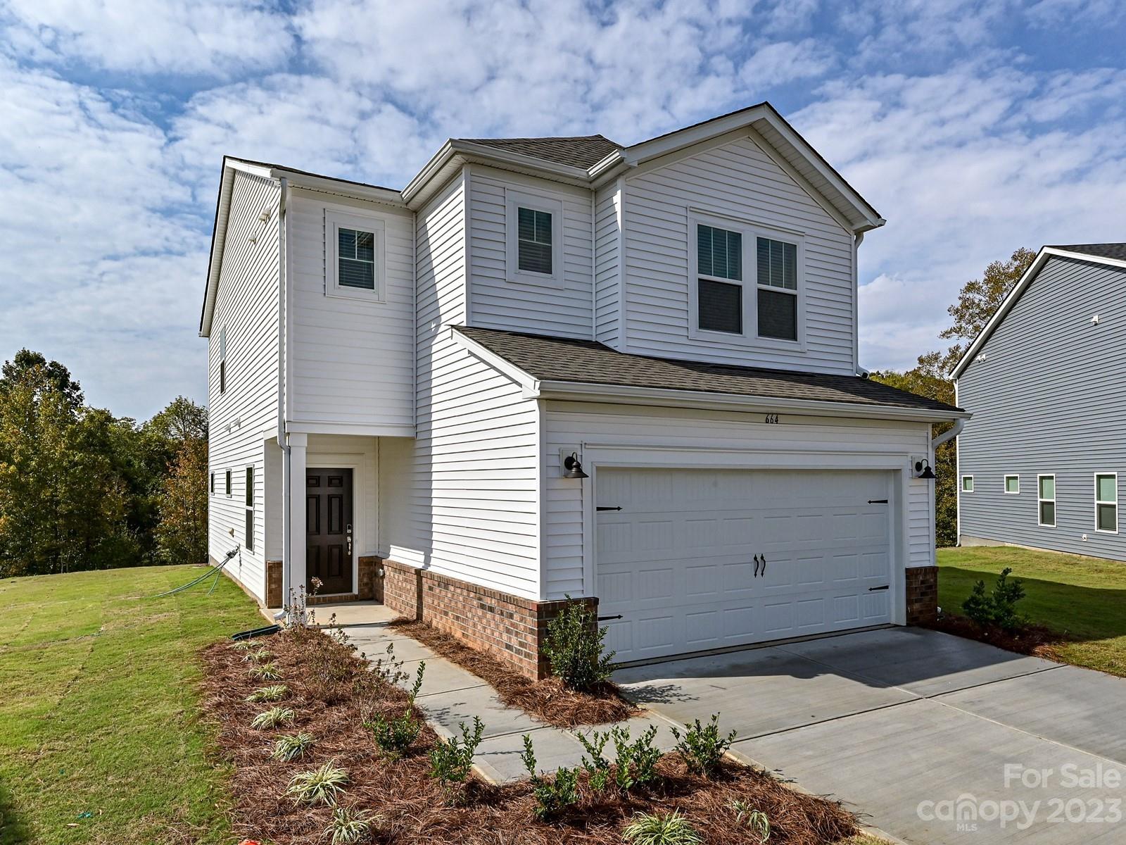 664 Citriadora Street Fort Mill, SC 29715 - Photo 1 of 27 a view of a house with a yard