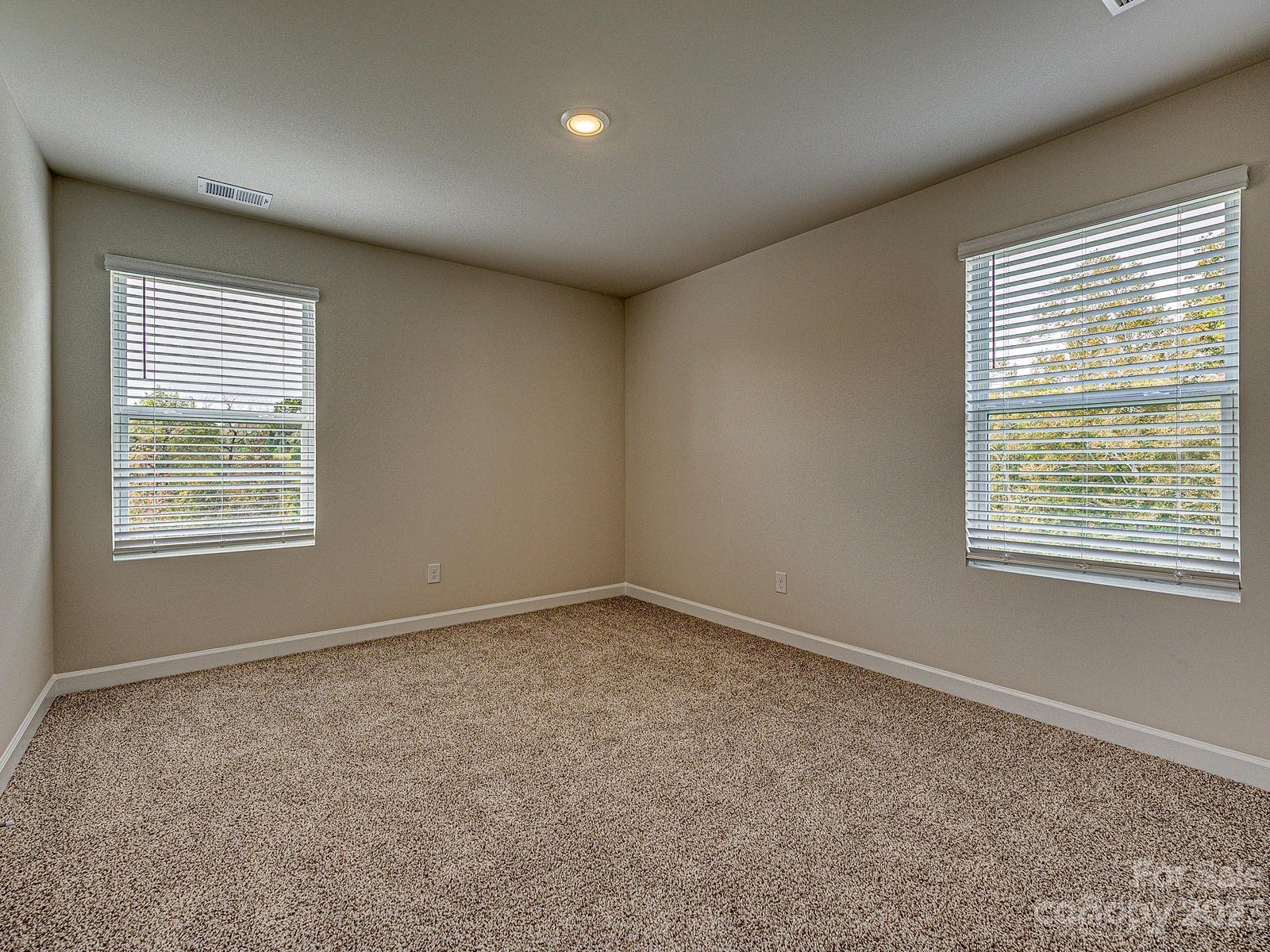 664 Citriadora Street Fort Mill, SC 29715 - Photo 19 of 27 an empty room with a window