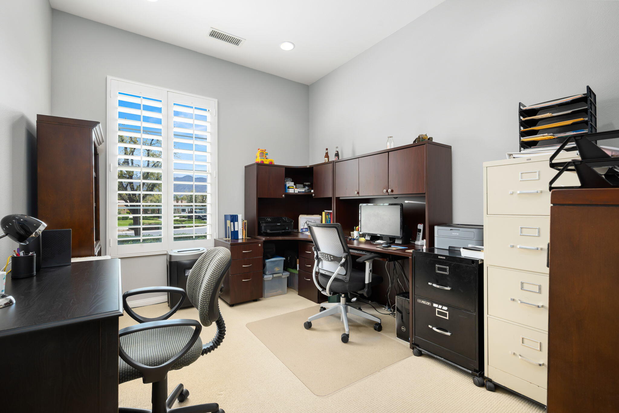 81768 Daniel Drive La Quinta, CA 92253 - Photo 23 of 81 a view of a workspace with furniture and a window
