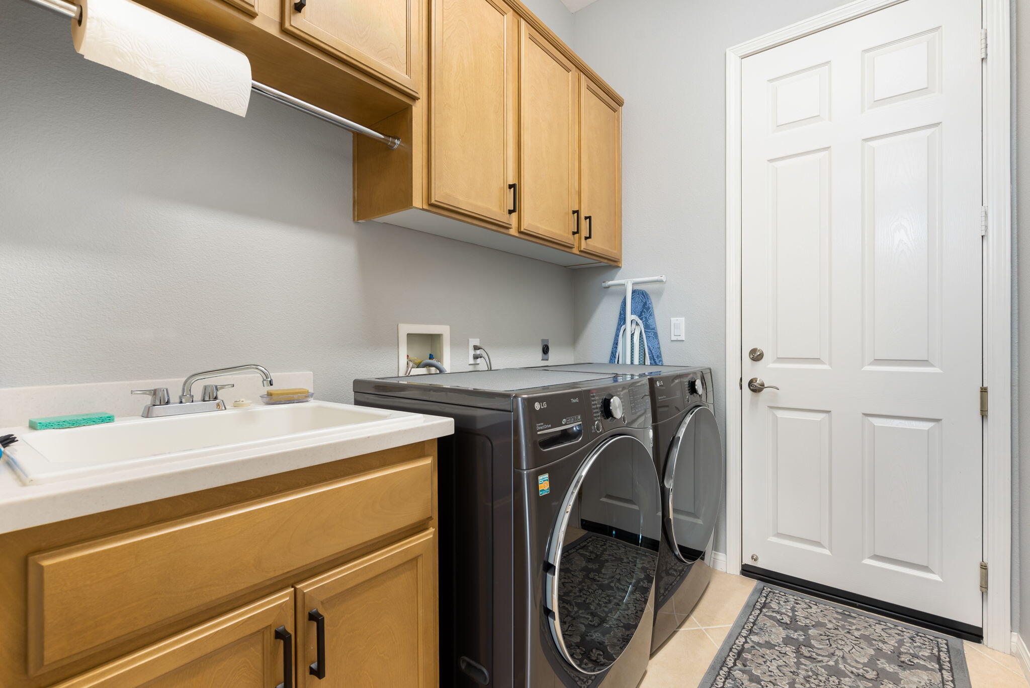 81768 Daniel Drive La Quinta, CA 92253 - Photo 26 of 81 a utility room with dryer and washer