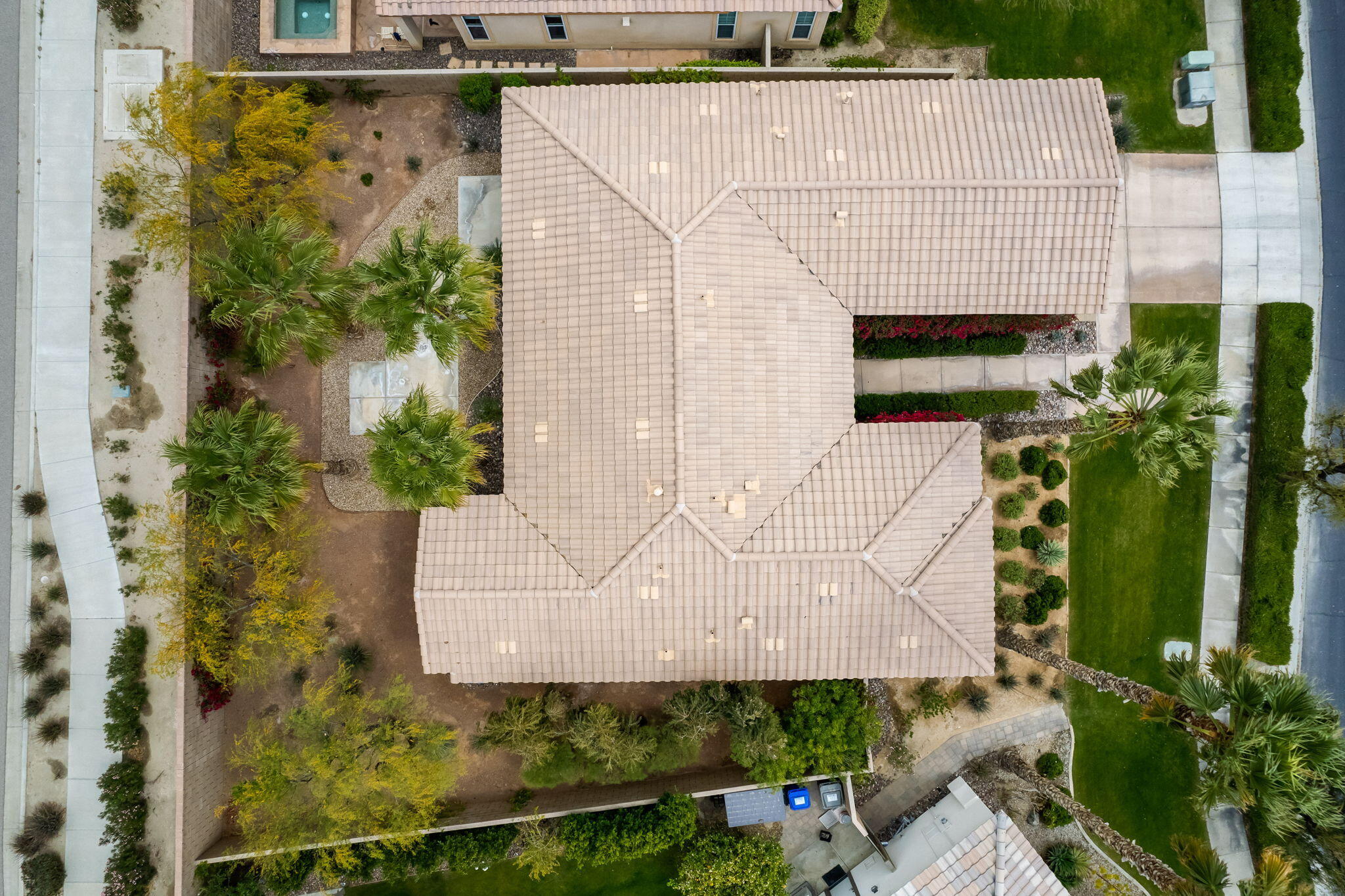 81768 Daniel Drive La Quinta, CA 92253 - Photo 38 of 81 an aerial view of a house with a yard and potted plants