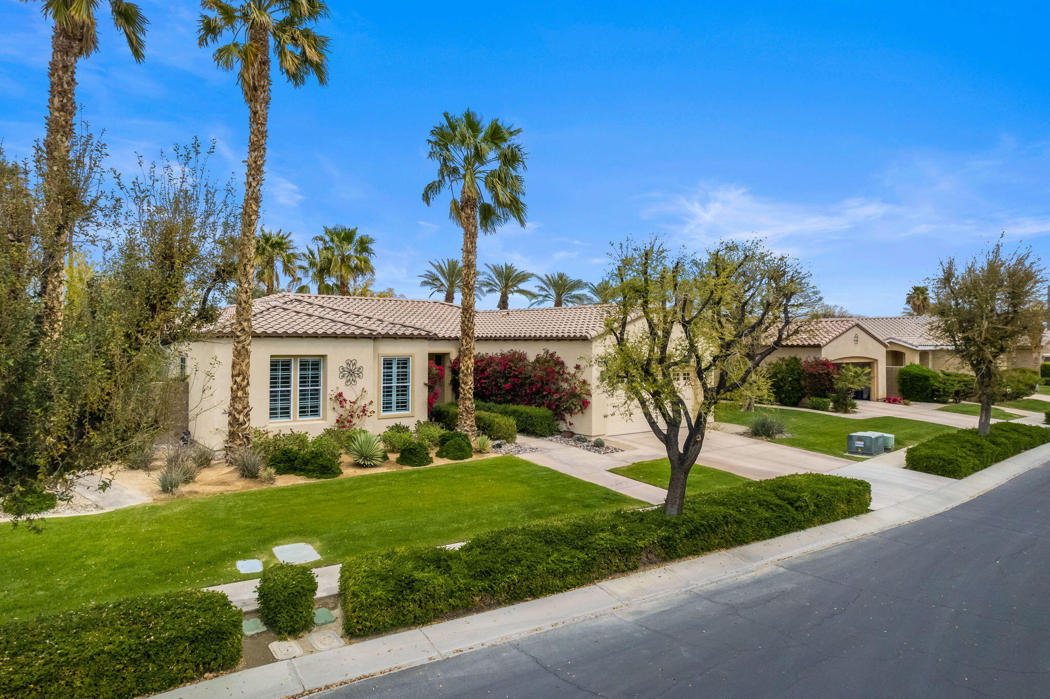 81768 Daniel Drive La Quinta, CA 92253 - Photo 40 of 81 a front view of house with yard and green space