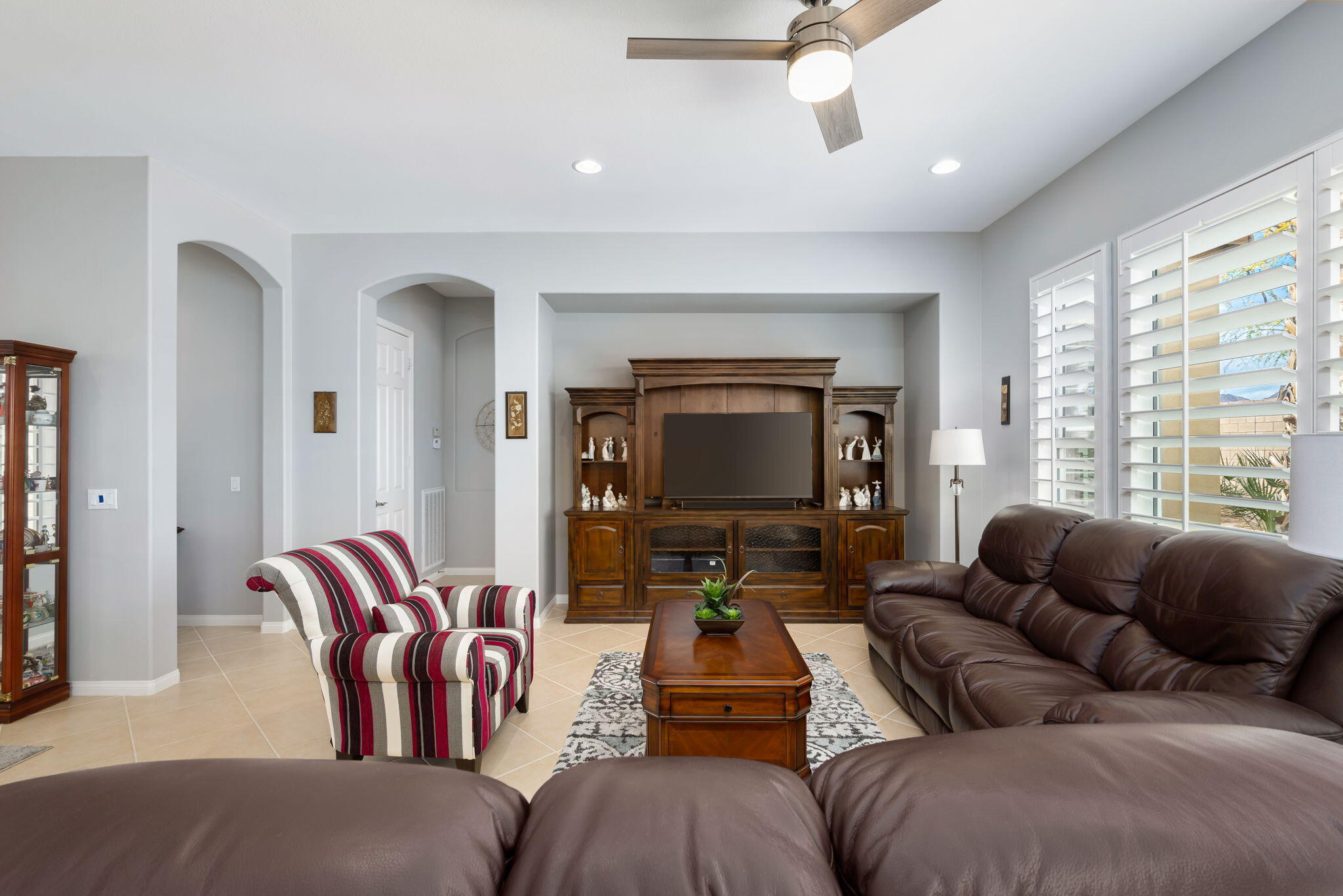 81768 Daniel Drive La Quinta, CA 92253 - Photo 6 of 81 a living room with furniture and a flat screen tv