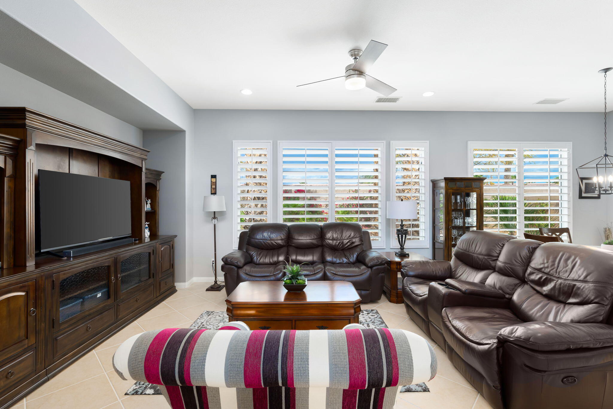 81768 Daniel Drive La Quinta, CA 92253 - Photo 8 of 81 a living room with furniture and a flat screen tv