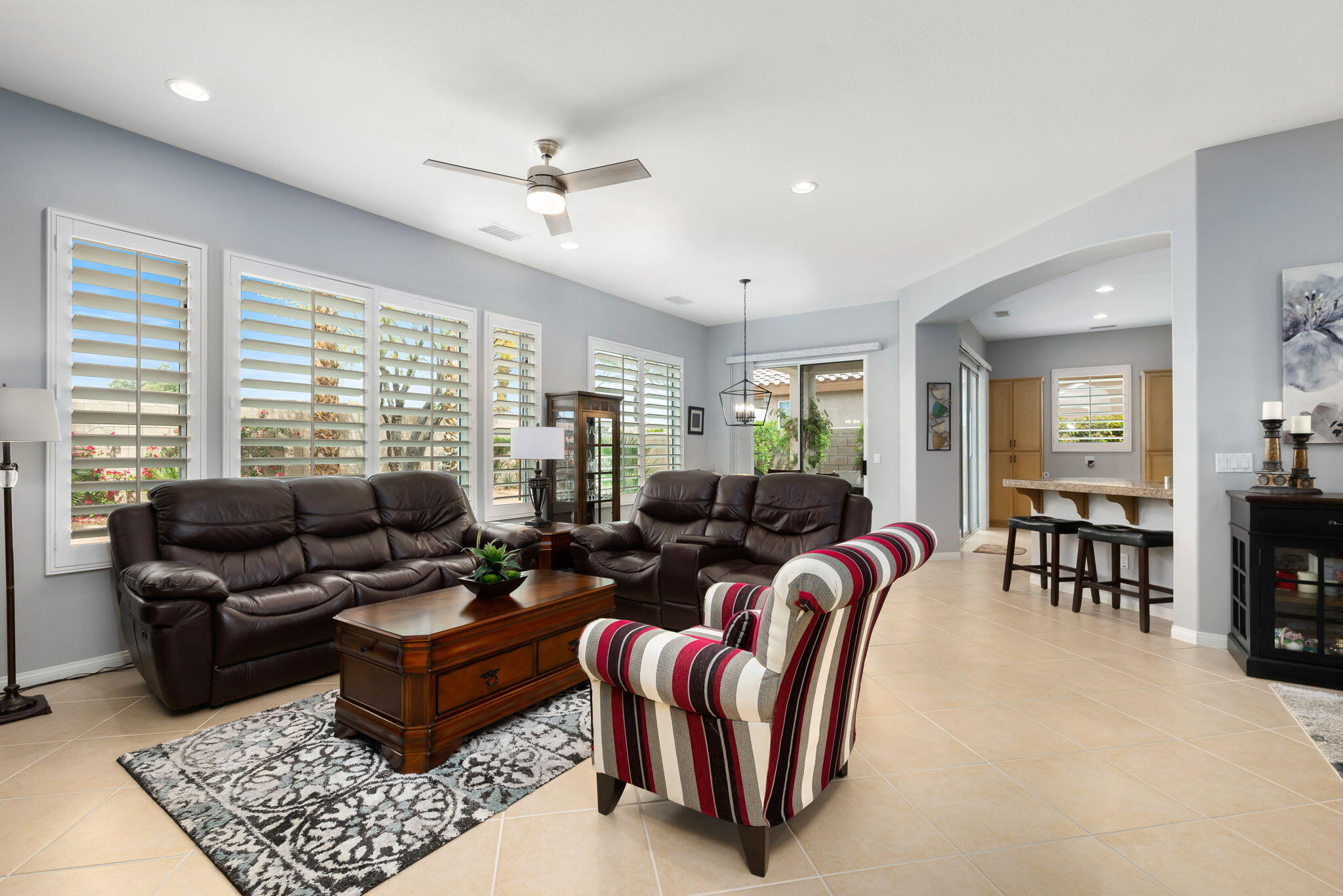 81768 Daniel Drive La Quinta, CA 92253 - Photo 9 of 81 a living room with furniture ceiling fan and a rug