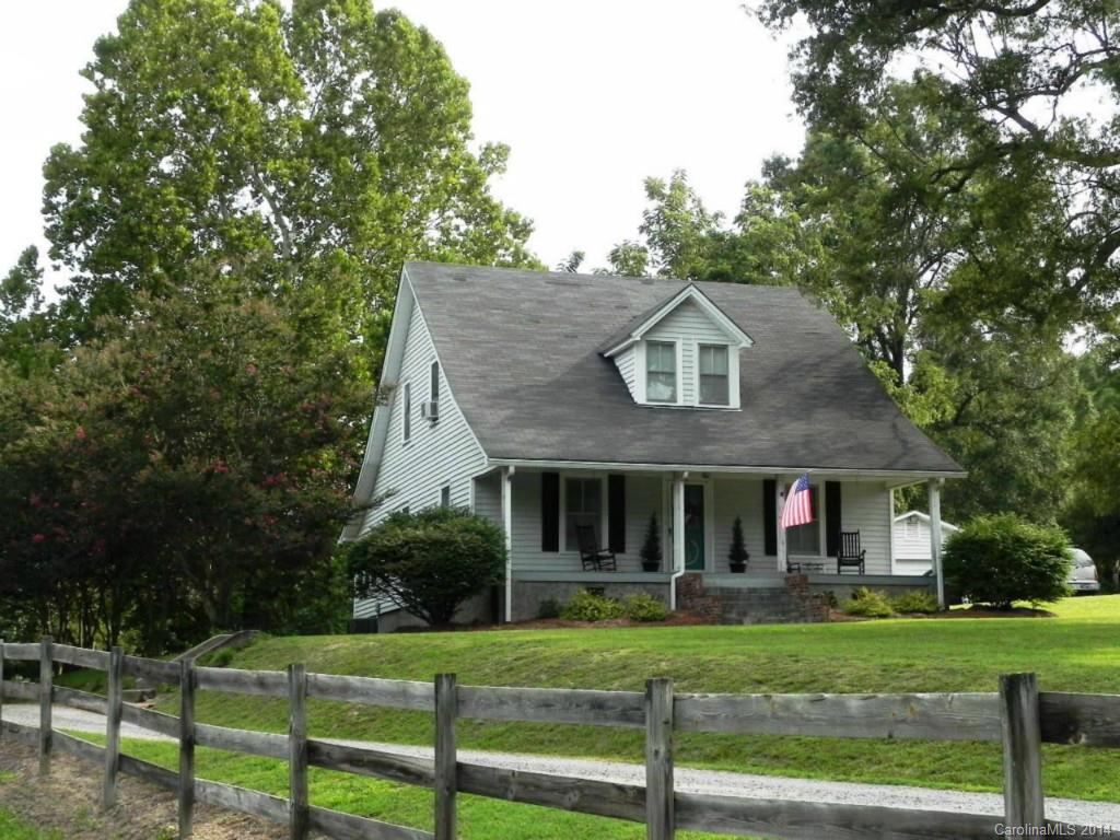 5930 Pagemont Road Kannapolis, NC 28081 - Photo 2 of 24 a front view of a house with a yard