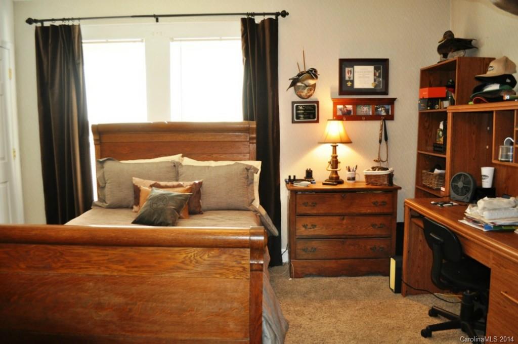 5930 Pagemont Road Kannapolis, NC 28081 - Photo 12 of 24 a bedroom with a bed and a window