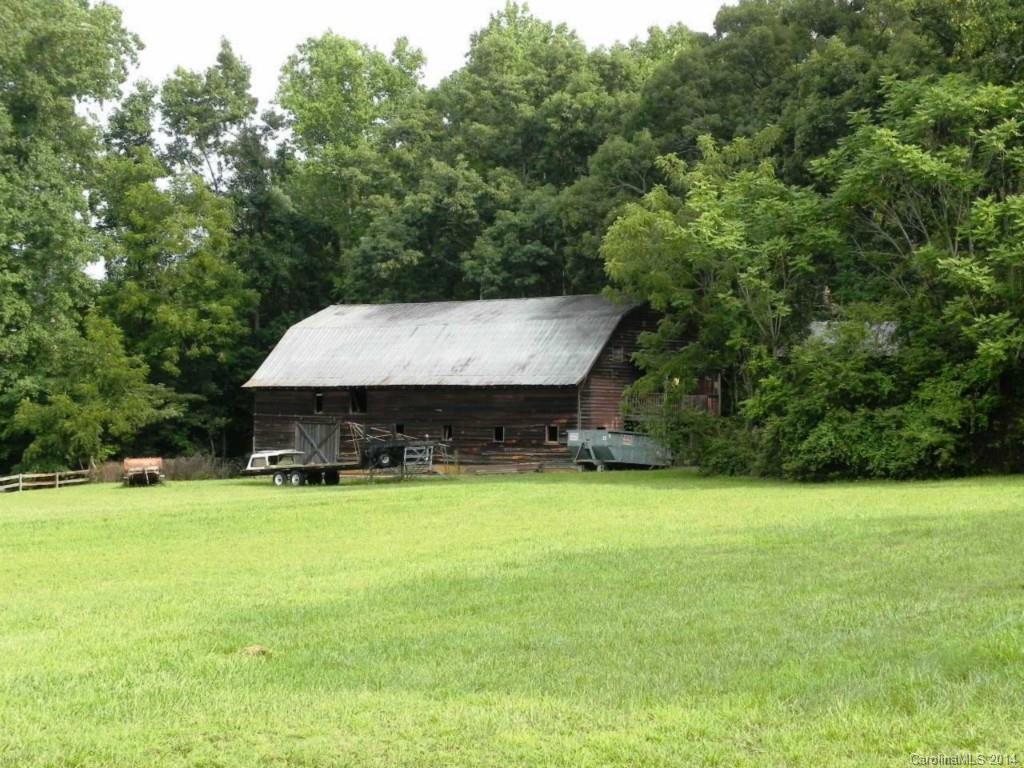 5930 Pagemont Road Kannapolis, NC 28081 - Photo 15 of 24 a backyard of a house with table and chairs