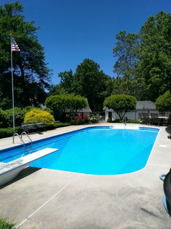 5930 Pagemont Road Kannapolis, NC 28081 - Photo 20 of 24 a view of a swimming pool with an outdoor space and seating area