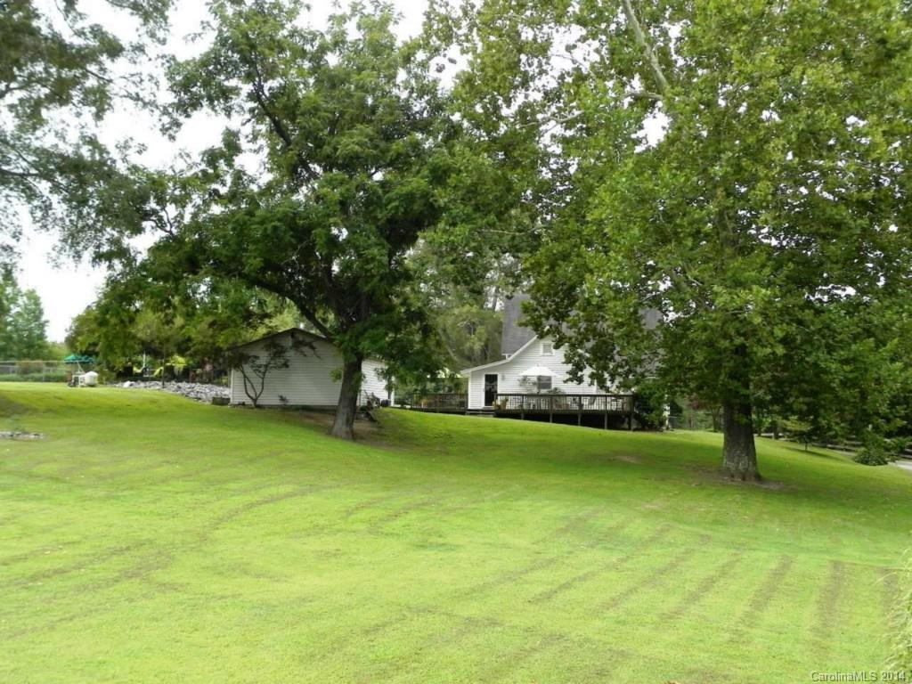 5930 Pagemont Road Kannapolis, NC 28081 - Photo 3 of 24 a view of a lake with a trees