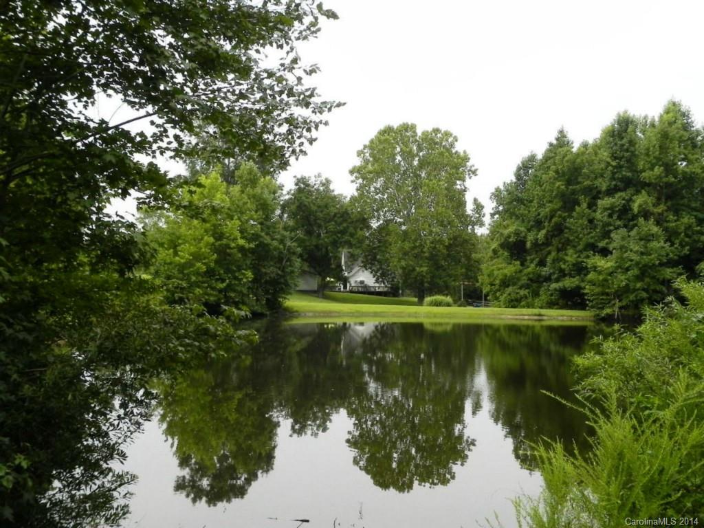 5930 Pagemont Road Kannapolis, NC 28081 - Photo 24 of 24 a view of a lake with a yard