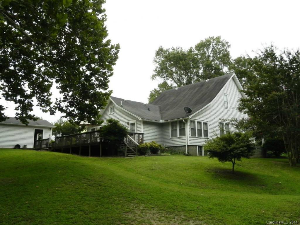 5930 Pagemont Road Kannapolis, NC 28081 - Photo 4 of 24 a front view of house with a garden and patio