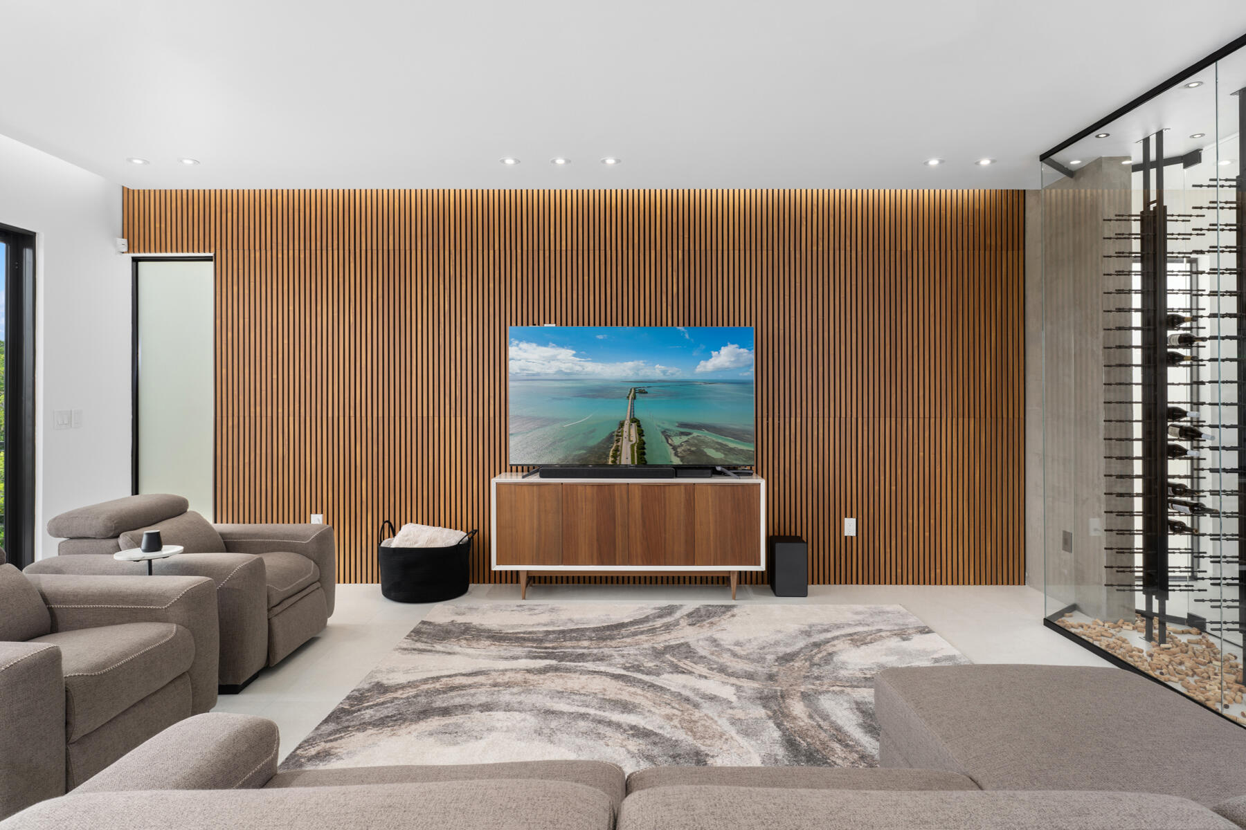 64 Andros Road Key Largo, FL 33037 - Photo 25 of 62 Great room with wood accent modern decor